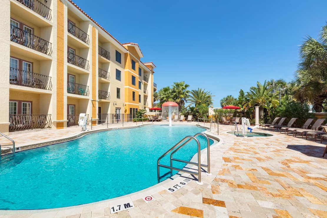 Castillo Real St. Augustine Beach Tapestry by Hilton pool